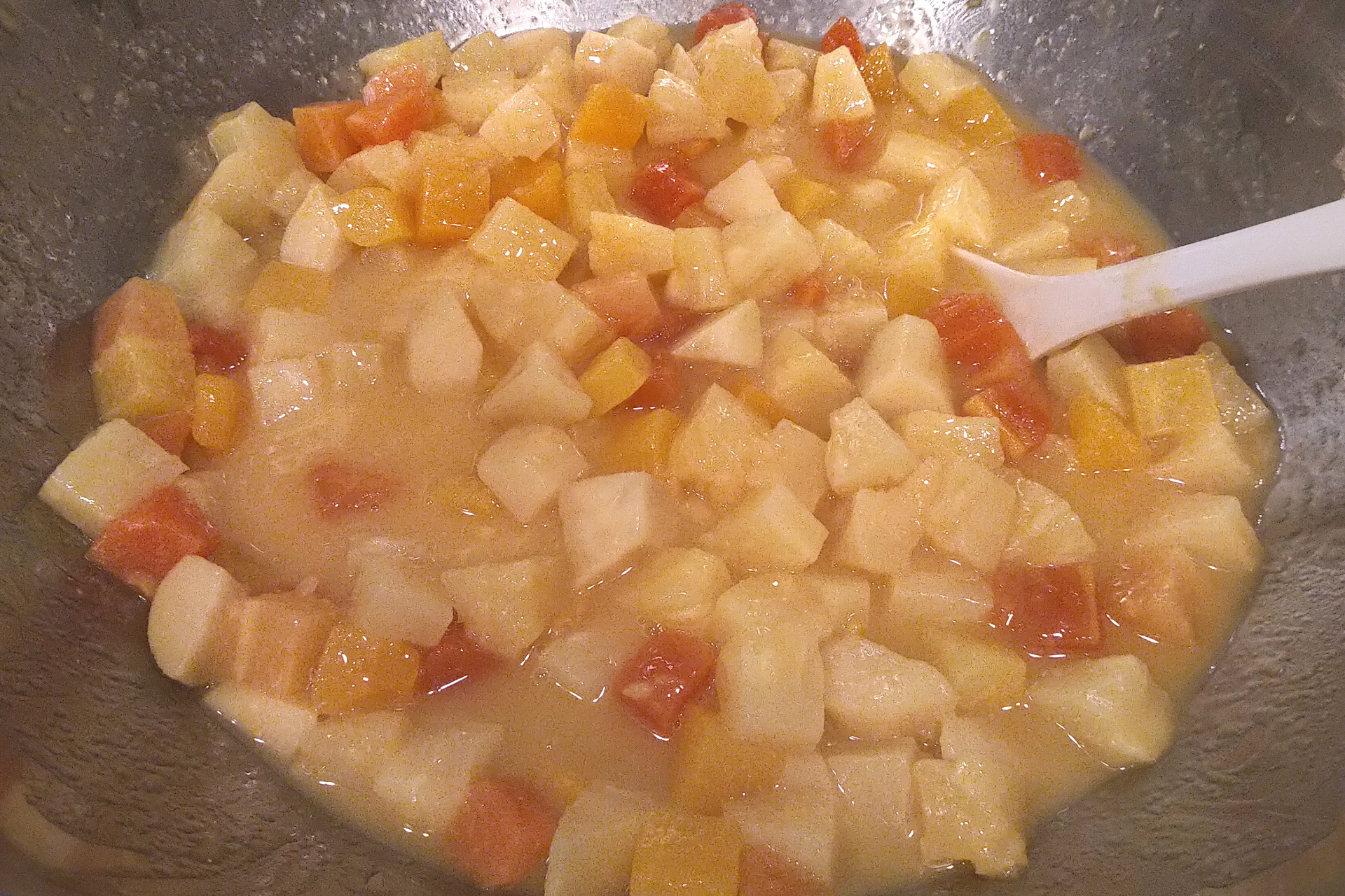 Tropical fruit salad in a metal bowl
