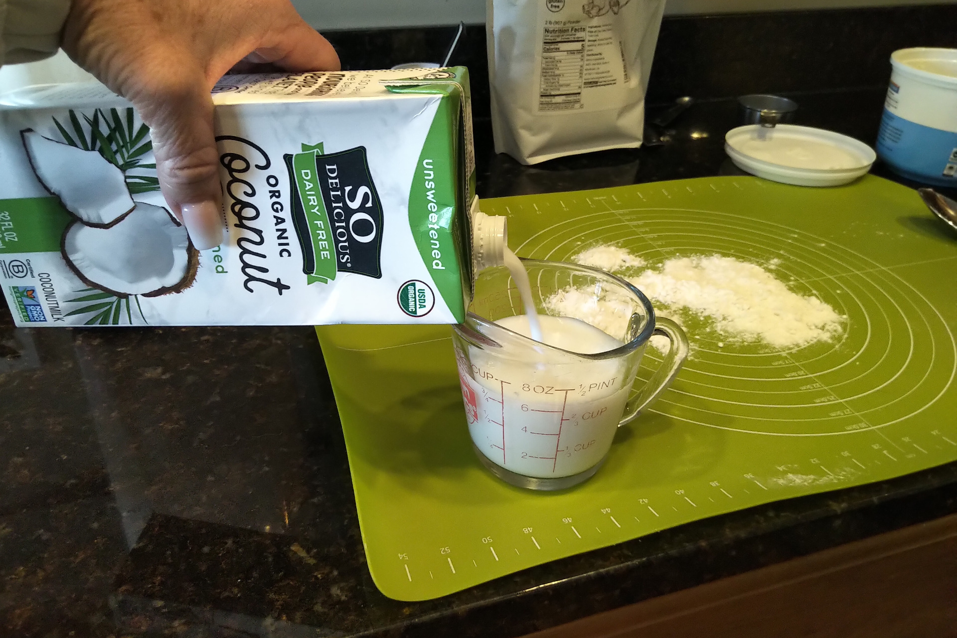 Measuring out coconut milk